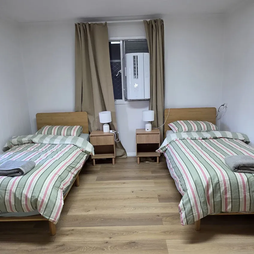 Chambre twin du co-living My Little France à Brisbane pour les nouveaux arrivants en PVT Australie.